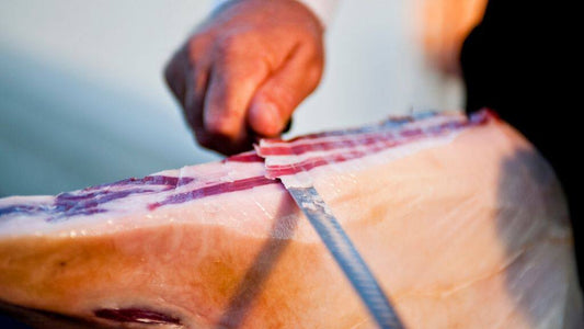 Indulge in Perfection: Hand-Sliced Iberian Ham, Crafted by Experts at Aroma Ibérico